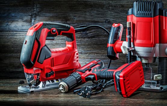 Electric hand tools red corded jigsaw cordless drill and small plunge router milling machine portable